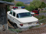 white Studebaker <br>Police Car