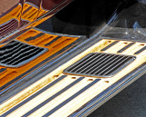 Running board and its reflection on side of car
