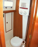 demand propane water heater over head, aft part of head/shower compartment
