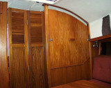salon looking aft with privacy panel raised and bi-fold doors closed