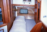 aft cabin berth, note port in hull, strbd aft