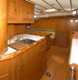 galley with sink on centreline & salon beyond