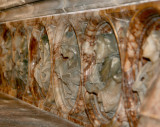 Carved marble frieze behind the alter.