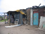 Poorest of the poor, many houses are made from scraps.  Most people are from the nearby S. Africa countries looking for jobs!