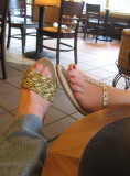two gold sandals