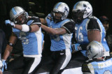 Kansas City Brigade players celebrate a touchdown