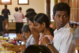 Praying in the Temple of the Sacred Tooth Relic, Kandy
