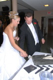 Cutting the grooms cake
