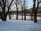 Ice in parking lot and river