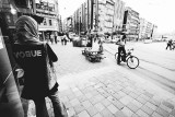 Vogue woman and man on bicycle