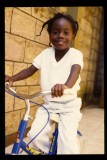 Kenya -- riding her new bike