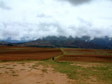 Fog, mountains, and farmland near Cusco