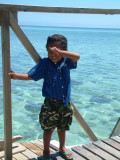 A shy Malo e lelei from a Tongan child