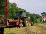 Green John Deere and red wagon   *