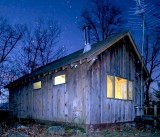 Hill top cabin at night