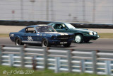 In a bold move, Brian overtakes a Shelby Mustang on the outside of this turn in his 84 SVO Mustang.