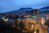 Riverside houses at night