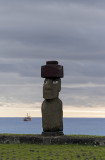 Moai in Hanga Roa, with freighter from Chilean mainland in background.