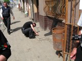 now around at the streetfront, we try to get into the basement, another known hiding place