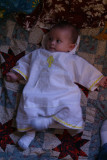 Josiah in his baptismal outfit made by dad.jpg