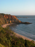 Red Bluff catches the sun - longer view