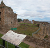 The fore-tower of  St Andrews Castle on the left