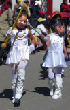 Two Small Dolls Are Leading Parade, Puno