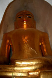 Closeup of another Buddha inside the Manuha Temple.  Notice the clasped hands in the foreground.