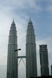 The towers were designed by architect Csar Pelli, were completed in 1998 and were the worlds tallest buildings at completion.