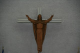 A crucifix hangs over the altar.