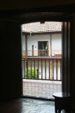 Doorway from one of the interior galleries looking out from the 2nd floor into the courtyard.