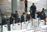 To the side of the demonstration, these police were standing by in case trouble ensued.