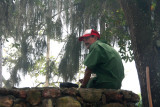 This Honduran man was taking a break on the wall.  He was in the line of the smoke, though.