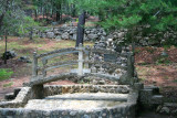 A concrete and stone bridge in Parque Naciones Unidas.