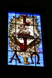 Some of the stained glass windows are traditional, and some are more modern like this one.