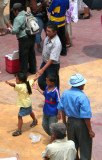 This man brought his children to the demonstration.