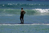 David on a wall on the Beach.