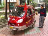 Chengdu In spite of the face hes making, he LOVES his vehicle!