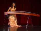 Guilin - Beautiful girl entertaining us during dinner with a  (Guzheng)