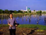 Tawau - Wong Tsu Shi at Kampung Ice Box, Tawau, shooting Egrets