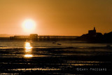 Mumbles pier and lighthouse sunrise
