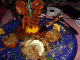 BROCHETTE DE CREVETTES ET QUEUES DE HOMARD FLAMBE AU PERNOT SAUCE TOMATE PERSILLE