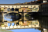 rowers under ponte vecchio