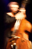 Three-faced bassist