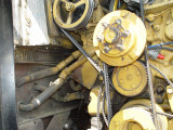 I HAVE THE IDLER PULLEY REMOVED HERE, NOTE THE HEATER HOSE PIPES THAT I PREVIOUSLY MENTIONED