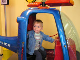 Noah had fun in the rescuecopter at the  Childrens Museum in March. Isnt he getting big?.JPG