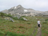 Cathy setting out from Saddleback Lake with Mount Conness in the background