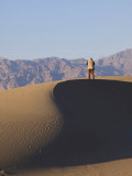 Composing on the crest, by Tim May. Mesquite Flats, Stovepipe Wells, Death Valley National Park, California, 2007