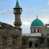 Sealed Windows In An Old House In The Wadi. At Background -  El Isticklal Mosque.JPG