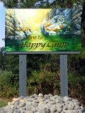 Welcome to Happy Camp town sign